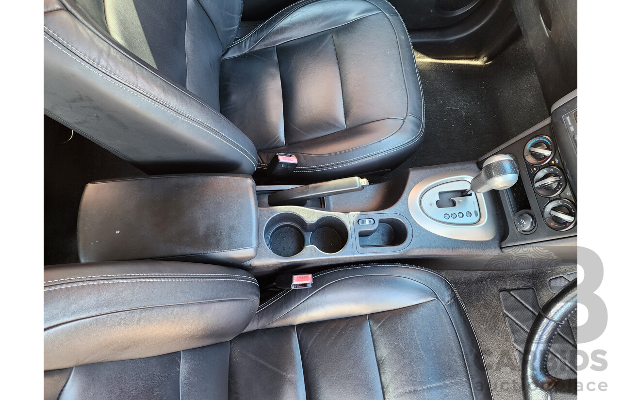 10/2013 Nissan Dualis +2 ST (4x2) J10 MY13 4d Wagon Red 2.0L