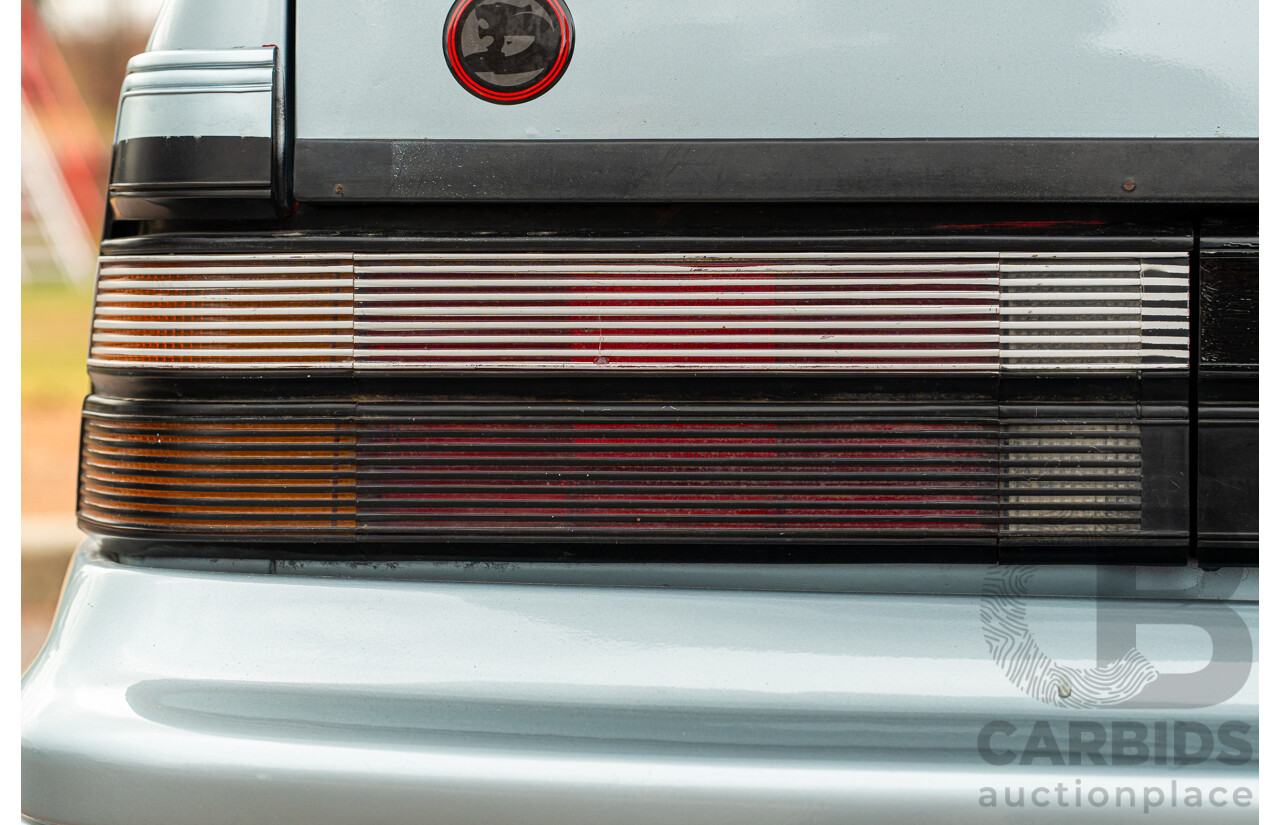10/1986 Holden VL Commodore Executive - Walkinshaw Group A Replica 4d Sedan Panorama Silver 3.0L