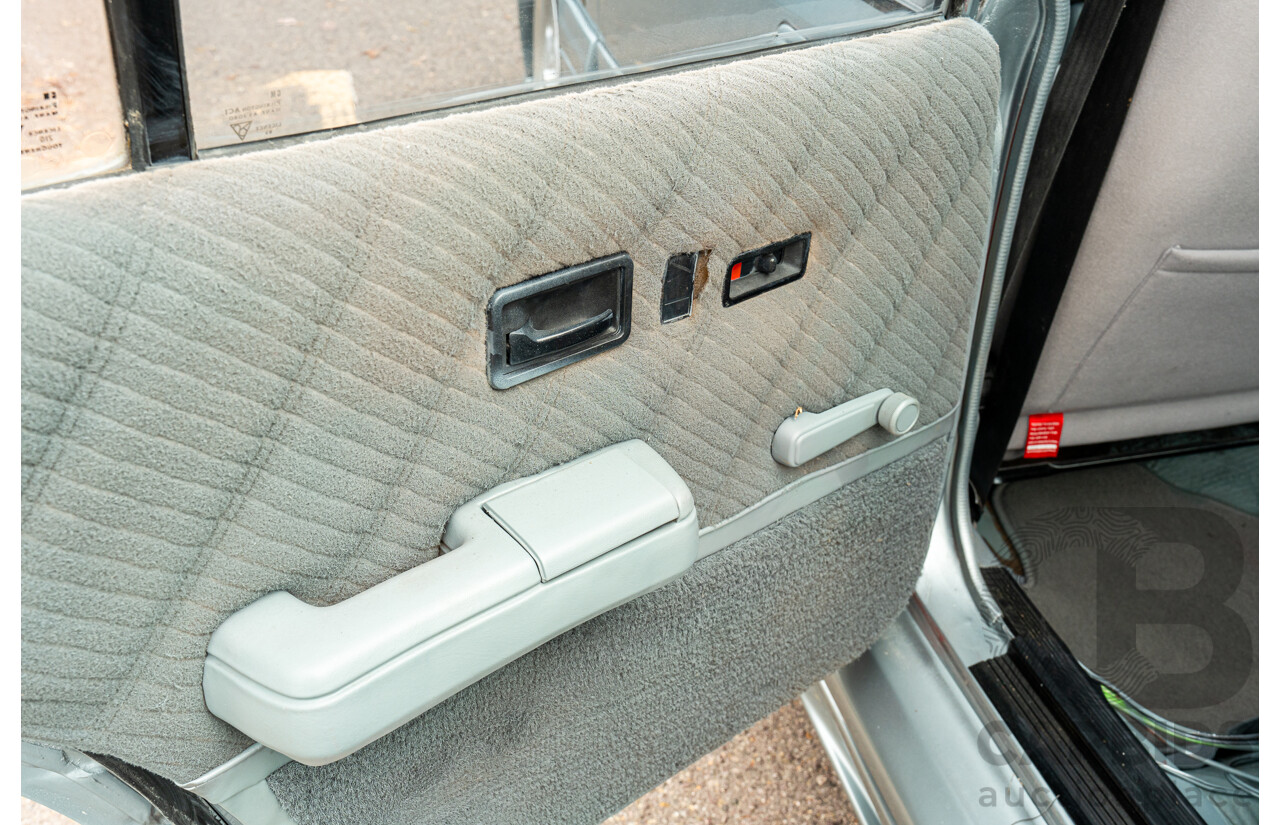 10/1986 Holden VL Commodore Executive - Walkinshaw Group A Replica 4d Sedan Panorama Silver 3.0L