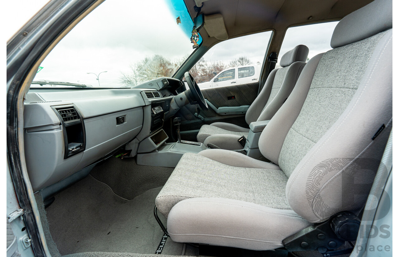 10/1986 Holden VL Commodore Executive - Walkinshaw Group A Replica 4d Sedan Panorama Silver 3.0L