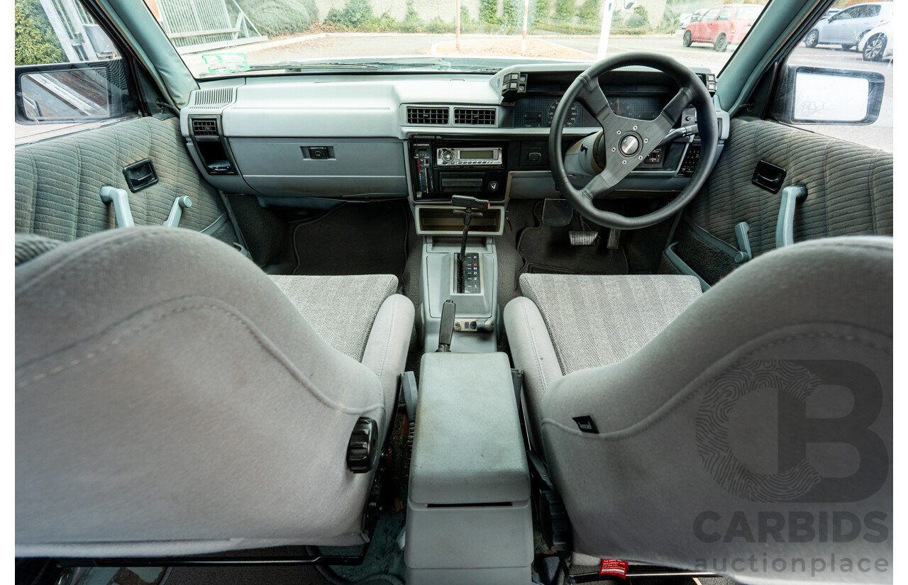 10/1986 Holden VL Commodore Executive - Walkinshaw Group A Replica 4d Sedan Panorama Silver 3.0L
