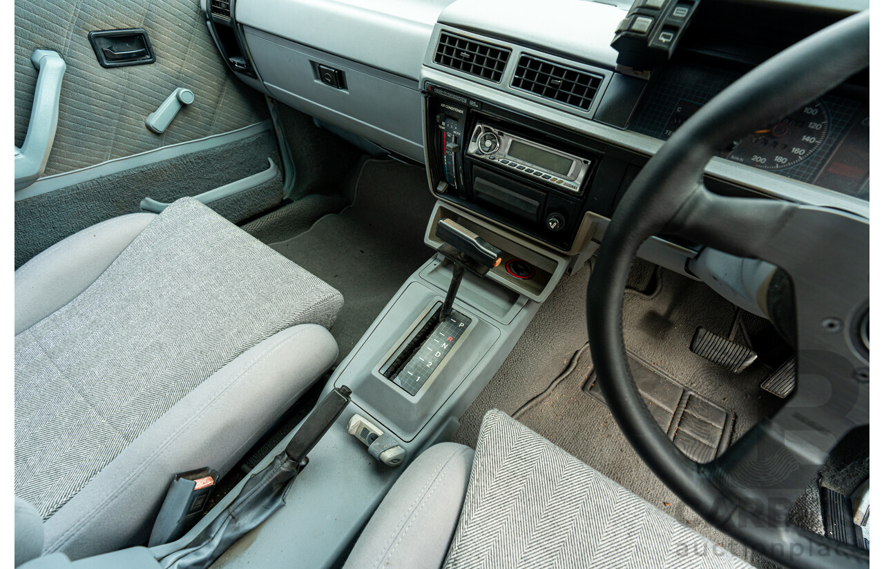 10/1986 Holden VL Commodore Executive - Walkinshaw Group A Replica 4d Sedan Panorama Silver 3.0L