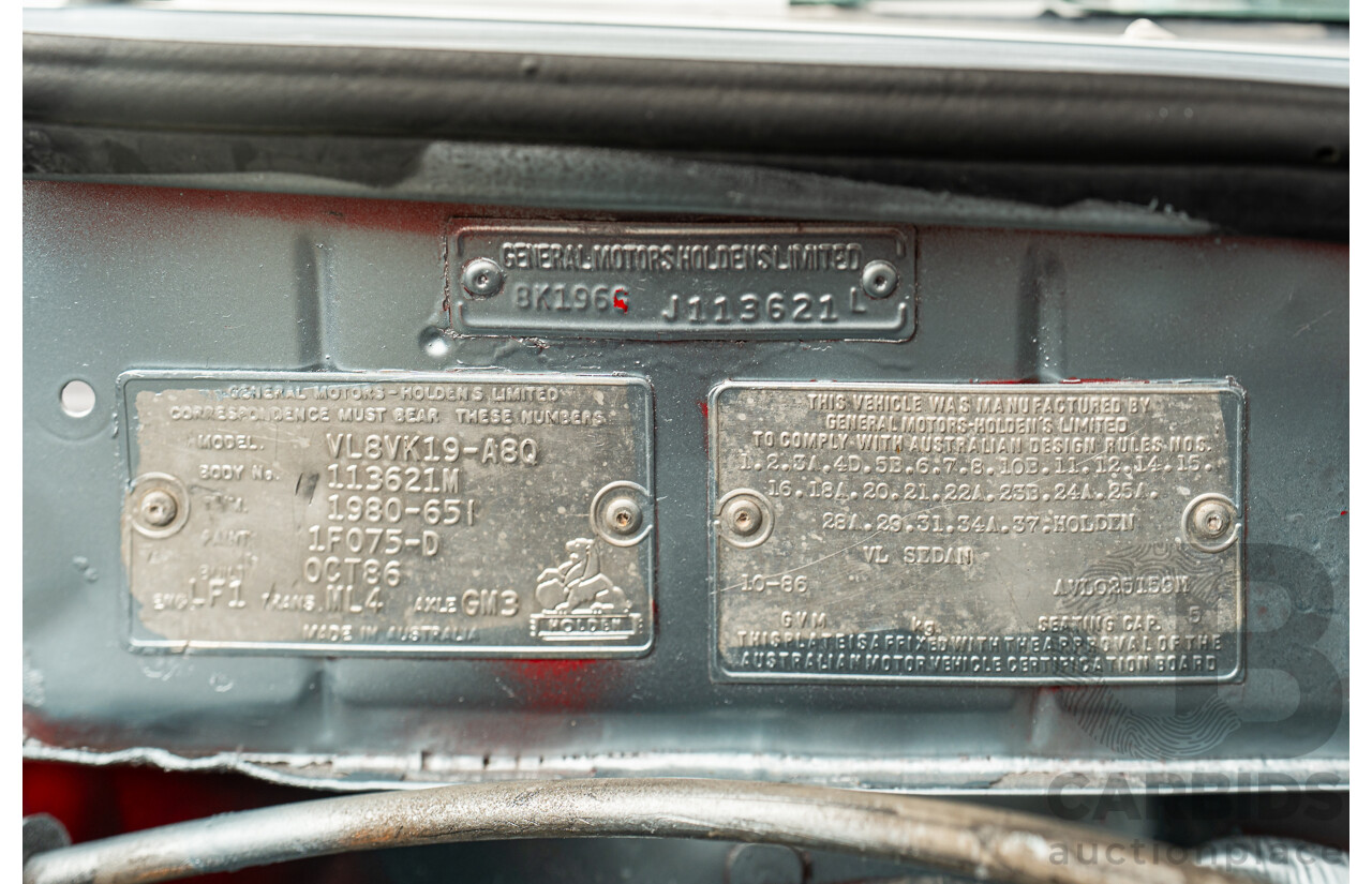 10/1986 Holden VL Commodore Executive - Walkinshaw Group A Replica 4d Sedan Panorama Silver 3.0L