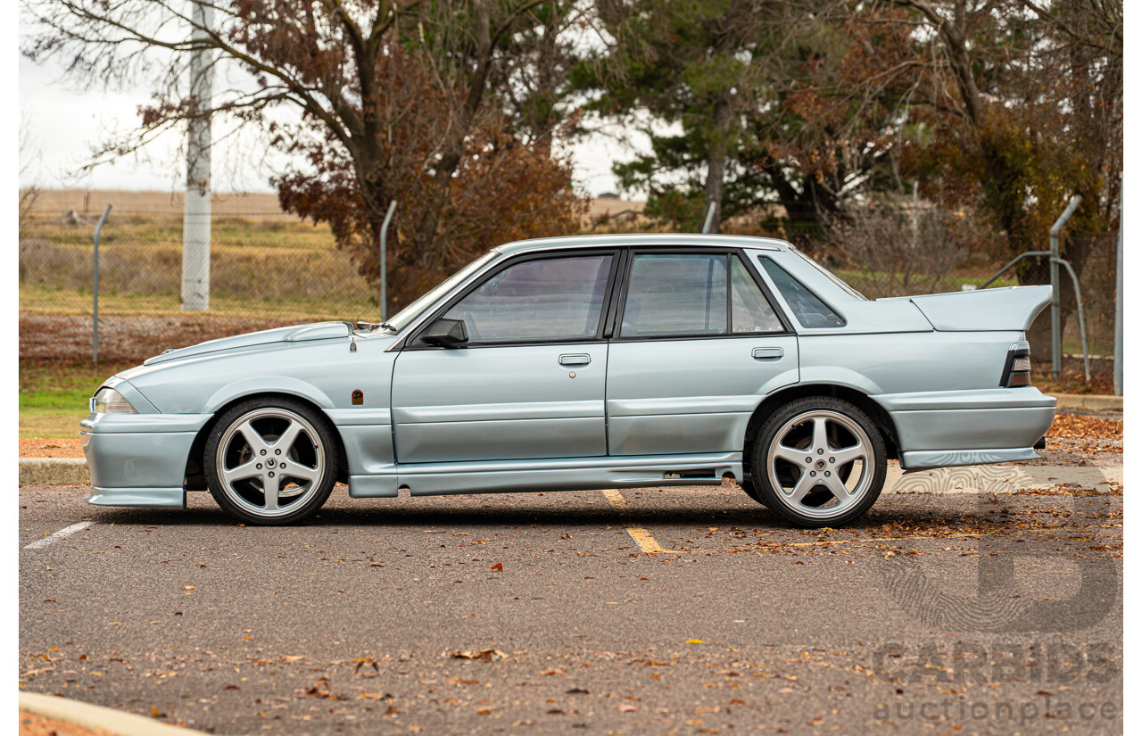 10/1986 Holden VL Commodore Executive - Walkinshaw Group A Replica 4d Sedan Panorama Silver 3.0L