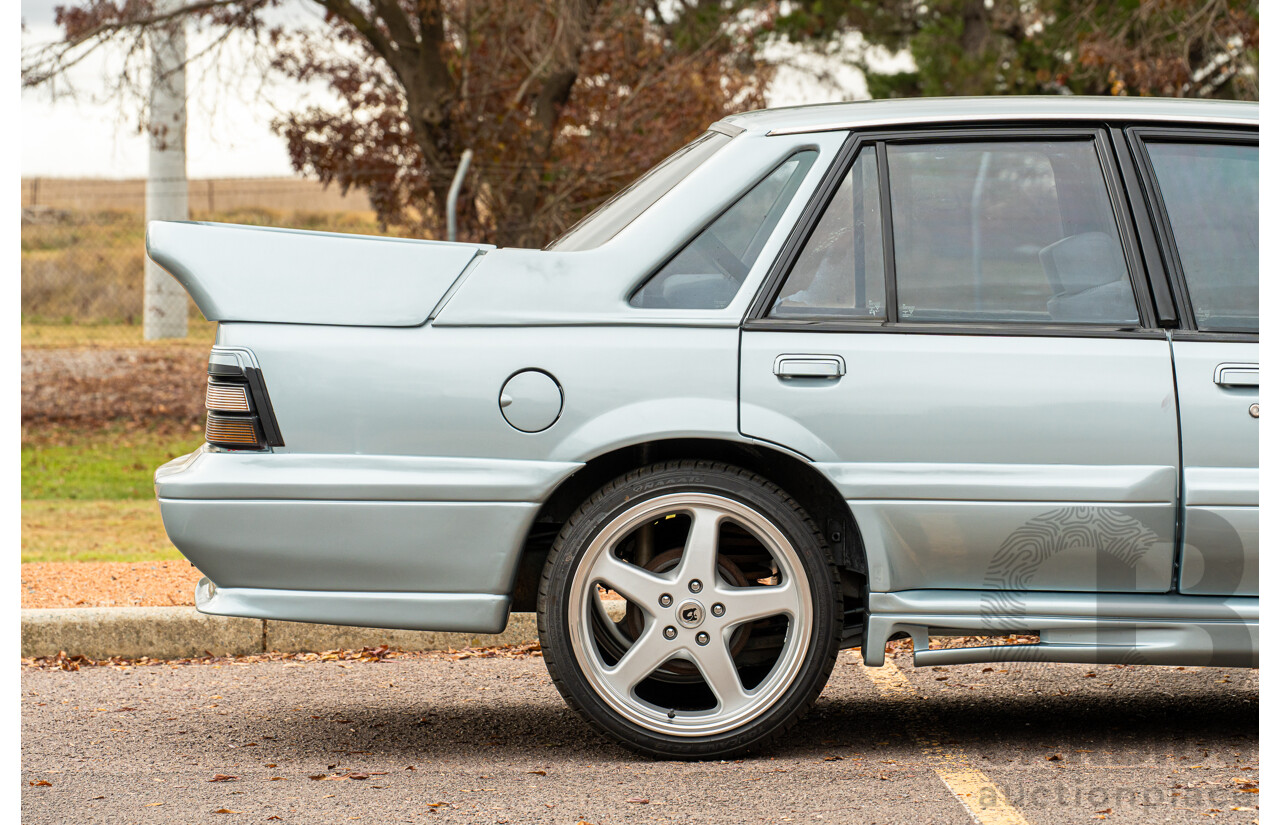 10/1986 Holden VL Commodore Executive - Walkinshaw Group A Replica 4d Sedan Panorama Silver 3.0L
