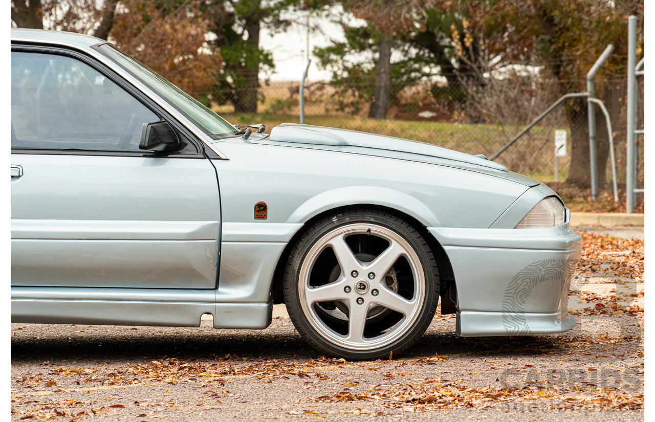 10/1986 Holden VL Commodore Executive - Walkinshaw Group A Replica 4d Sedan Panorama Silver 3.0L