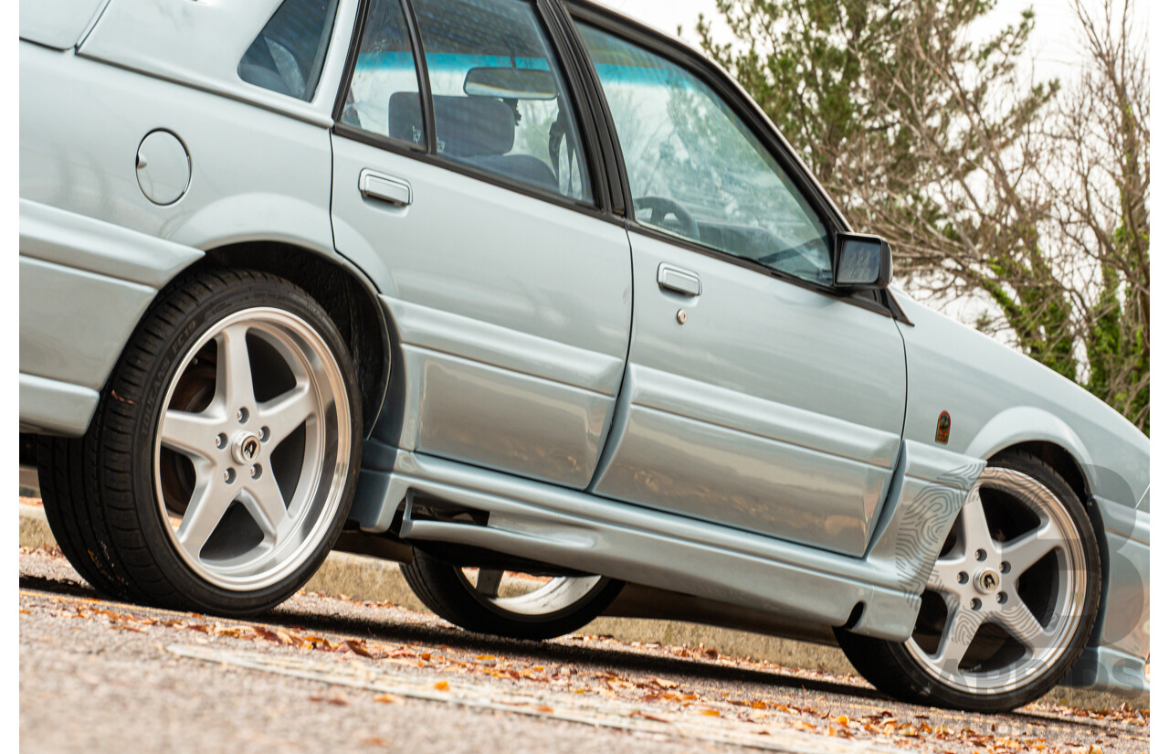 10/1986 Holden VL Commodore Executive - Walkinshaw Group A Replica 4d Sedan Panorama Silver 3.0L