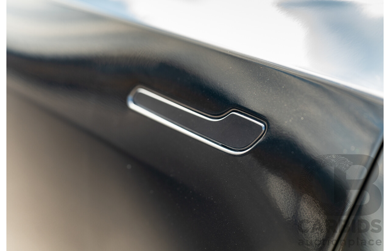 07/2023 Tesla Model Y Rear Wheel Drive 4d Wagon Solid Black Dedicated Electric EV 220kw