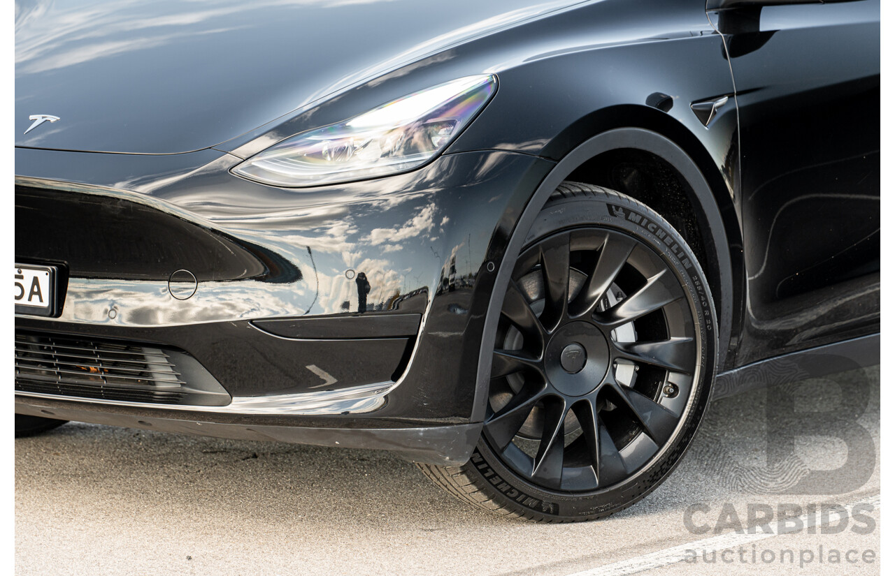 07/2023 Tesla Model Y Rear Wheel Drive 4d Wagon Solid Black Dedicated Electric EV 220kw