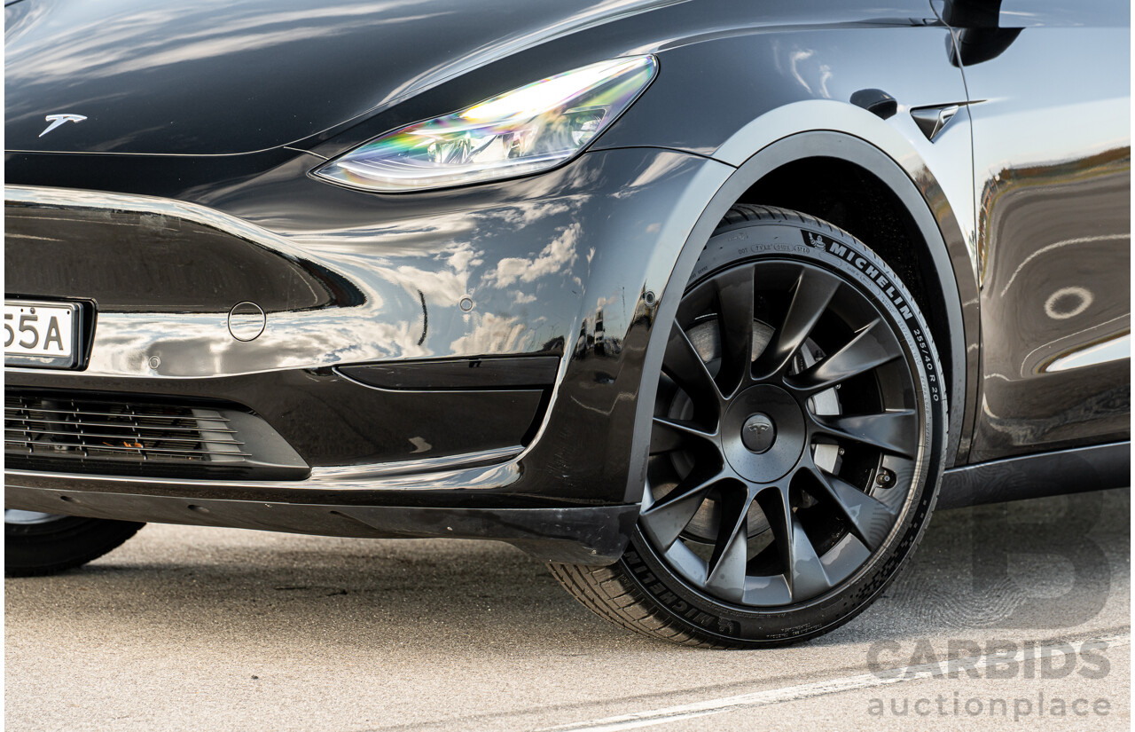 07/2023 Tesla Model Y Rear Wheel Drive 4d Wagon Solid Black Dedicated Electric EV 220kw