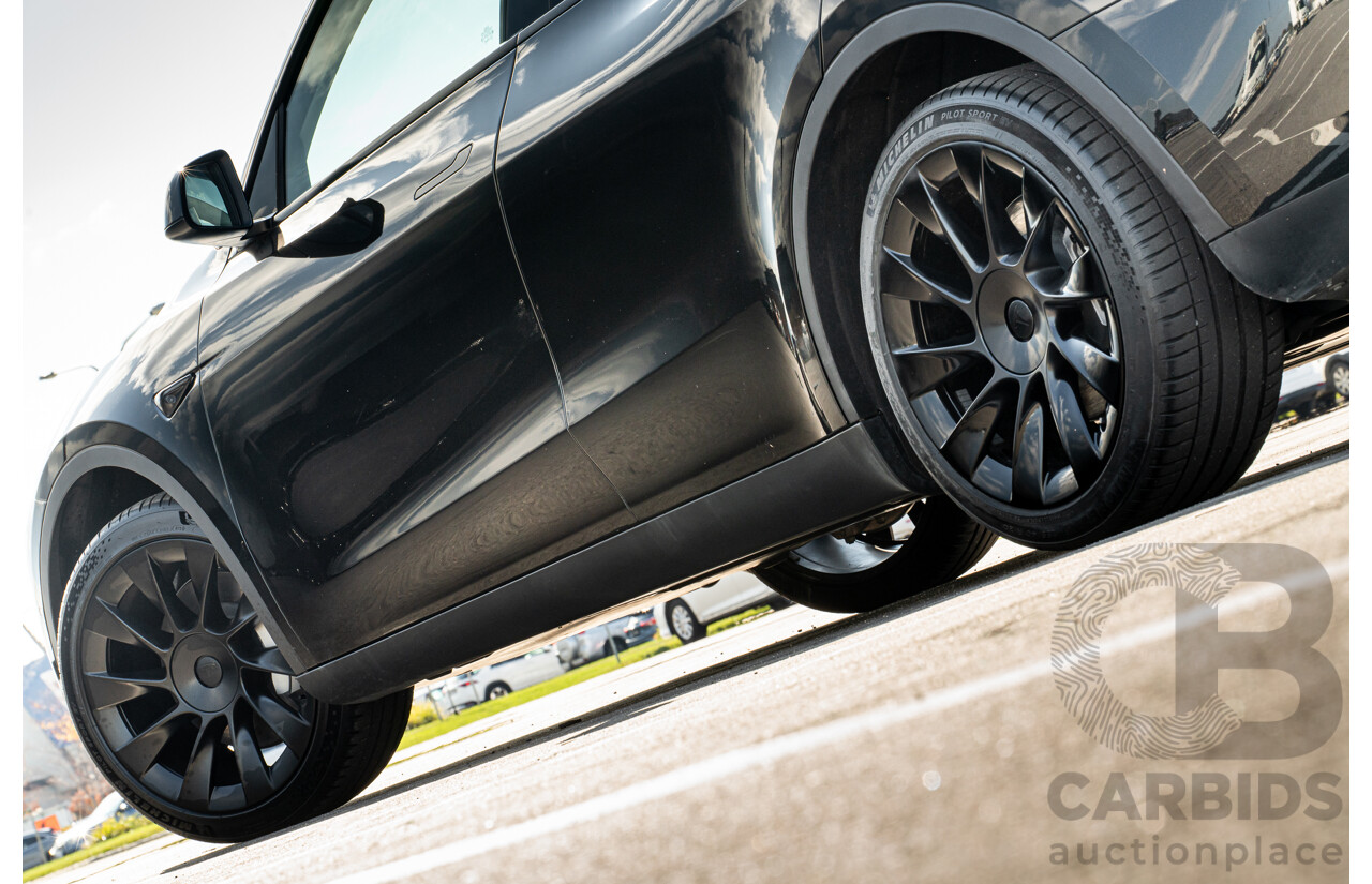 07/2023 Tesla Model Y Rear Wheel Drive 4d Wagon Solid Black Dedicated Electric EV 220kw