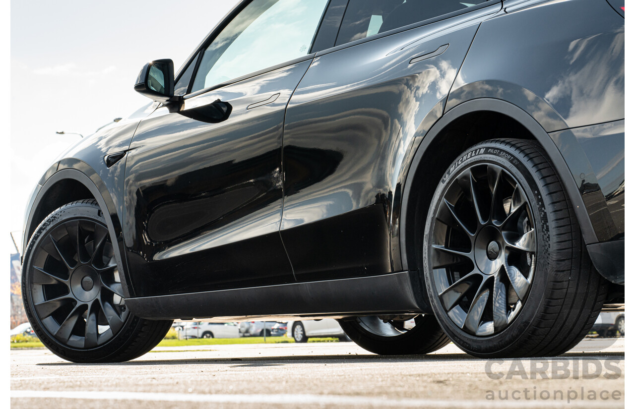 07/2023 Tesla Model Y Rear Wheel Drive 4d Wagon Solid Black Dedicated Electric EV 220kw