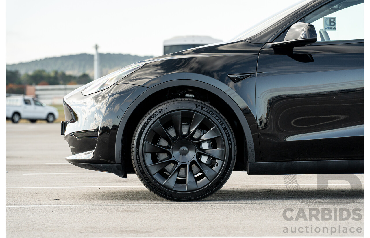 07/2023 Tesla Model Y Rear Wheel Drive 4d Wagon Solid Black Dedicated Electric EV 220kw