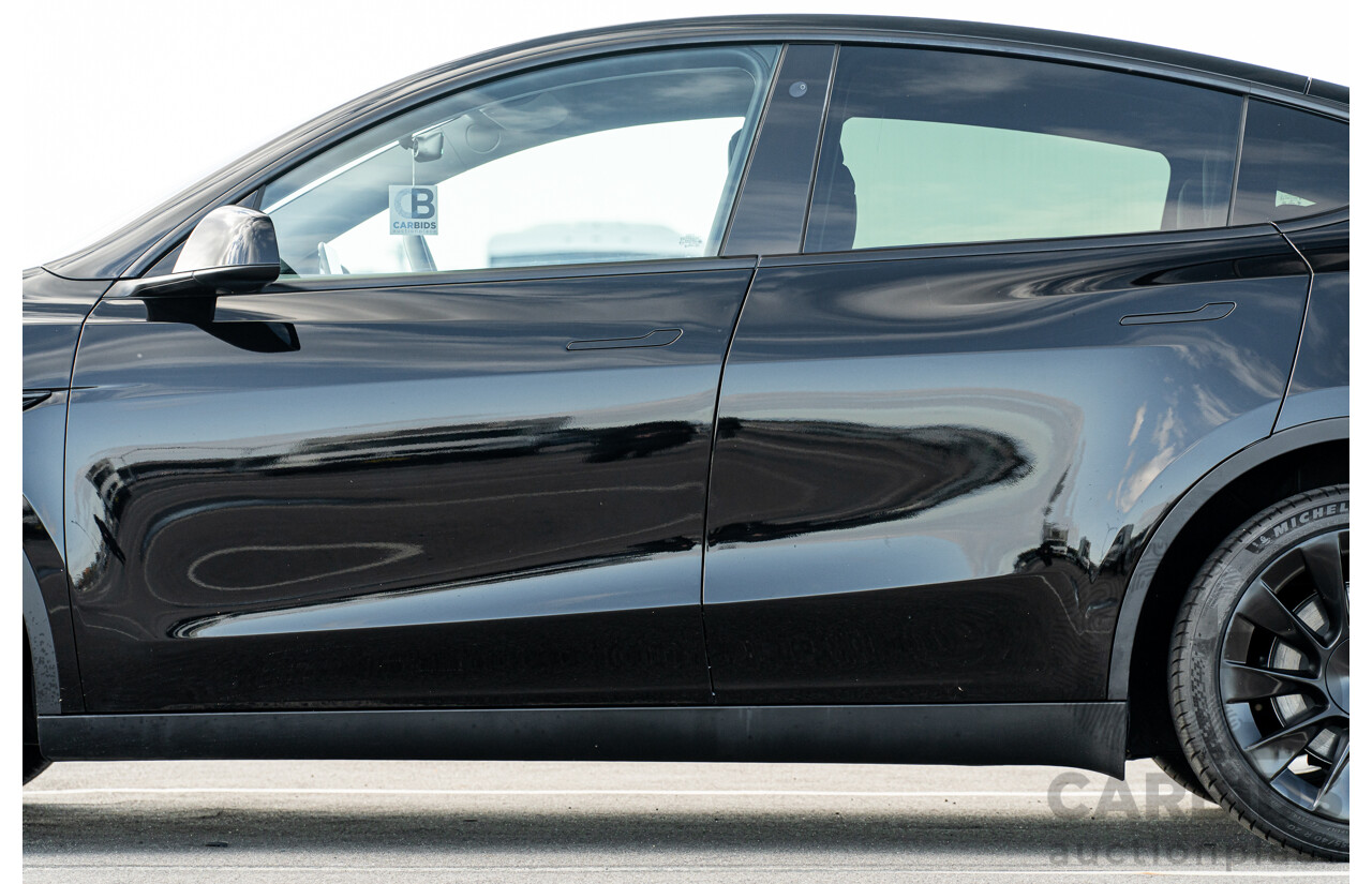 07/2023 Tesla Model Y Rear Wheel Drive 4d Wagon Solid Black Dedicated Electric EV 220kw