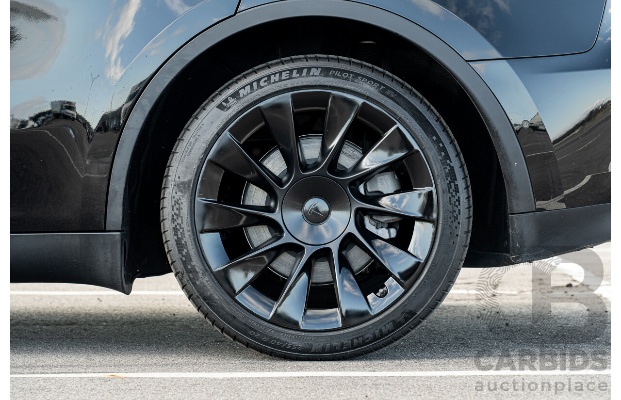 07/2023 Tesla Model Y Rear Wheel Drive 4d Wagon Solid Black Dedicated Electric EV 220kw