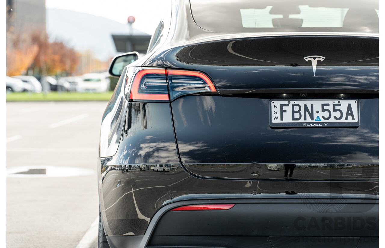07/2023 Tesla Model Y Rear Wheel Drive 4d Wagon Solid Black Dedicated Electric EV 220kw