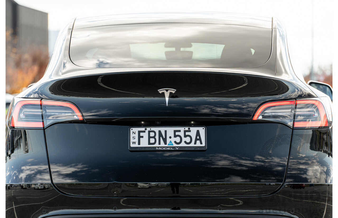 07/2023 Tesla Model Y Rear Wheel Drive 4d Wagon Solid Black Dedicated Electric EV 220kw