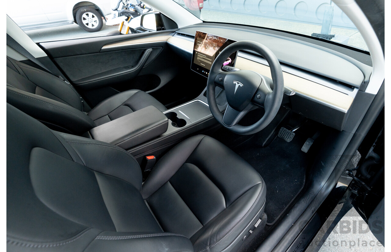 07/2023 Tesla Model Y Rear Wheel Drive 4d Wagon Solid Black Dedicated Electric EV 220kw