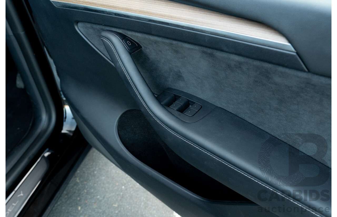 07/2023 Tesla Model Y Rear Wheel Drive 4d Wagon Solid Black Dedicated Electric EV 220kw