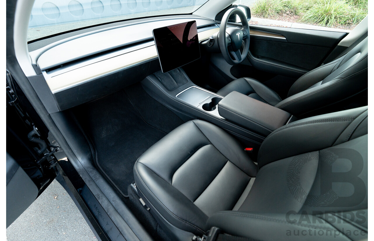 07/2023 Tesla Model Y Rear Wheel Drive 4d Wagon Solid Black Dedicated Electric EV 220kw