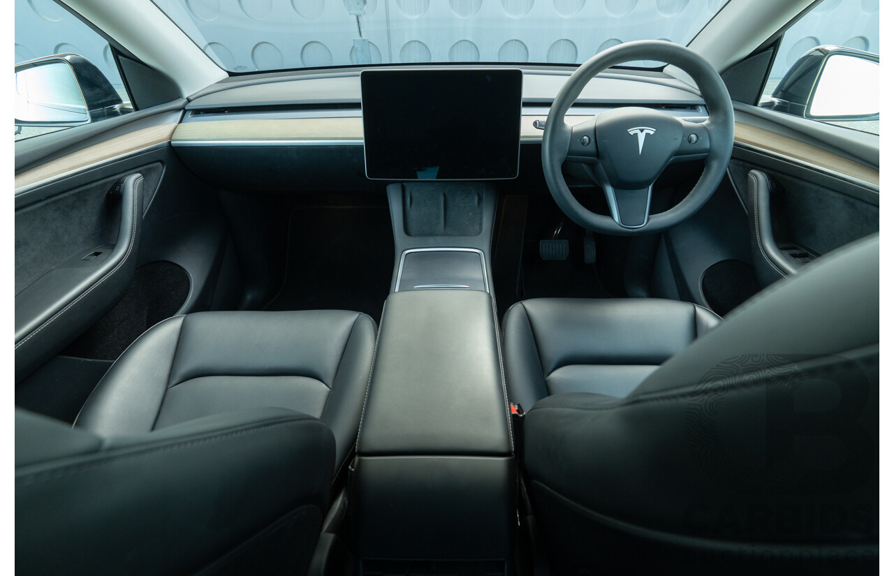 07/2023 Tesla Model Y Rear Wheel Drive 4d Wagon Solid Black Dedicated Electric EV 220kw