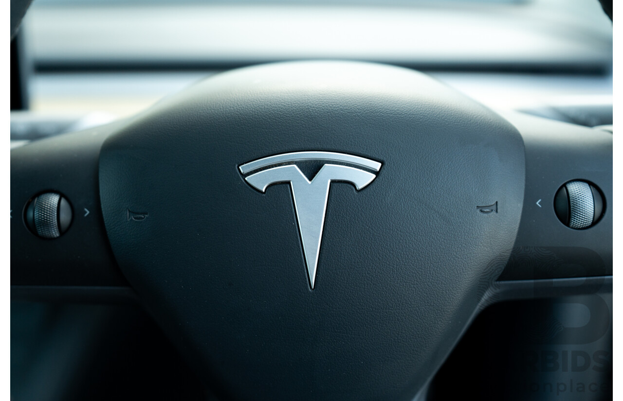 07/2023 Tesla Model Y Rear Wheel Drive 4d Wagon Solid Black Dedicated Electric EV 220kw