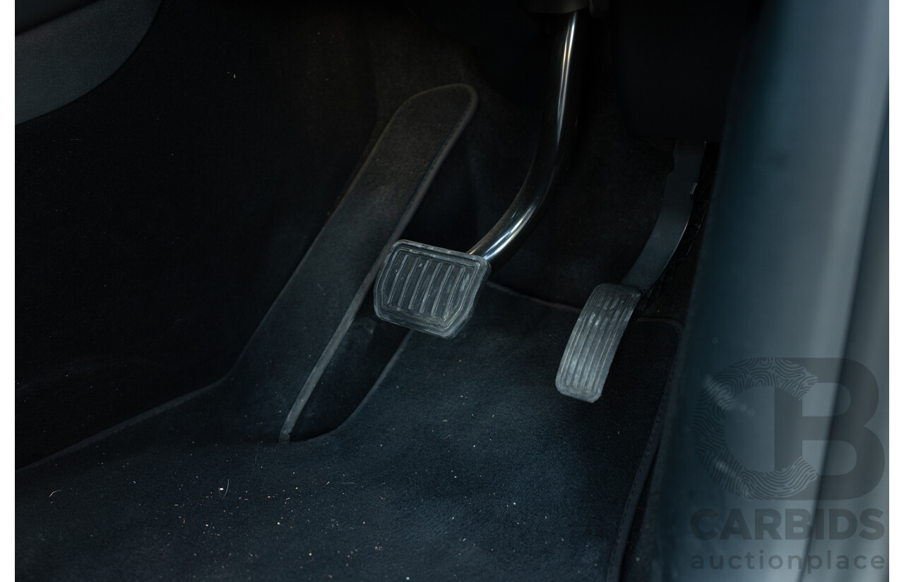 07/2023 Tesla Model Y Rear Wheel Drive 4d Wagon Solid Black Dedicated Electric EV 220kw