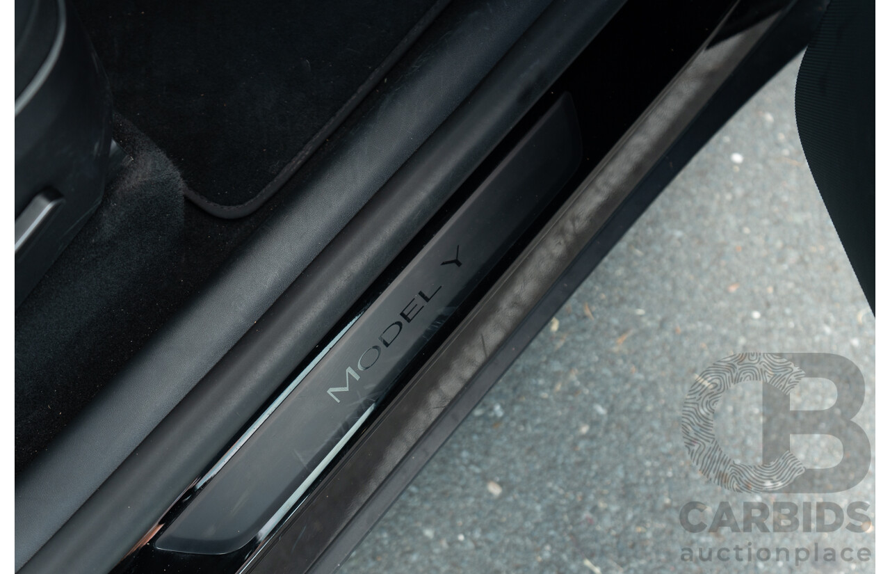 07/2023 Tesla Model Y Rear Wheel Drive 4d Wagon Solid Black Dedicated Electric EV 220kw