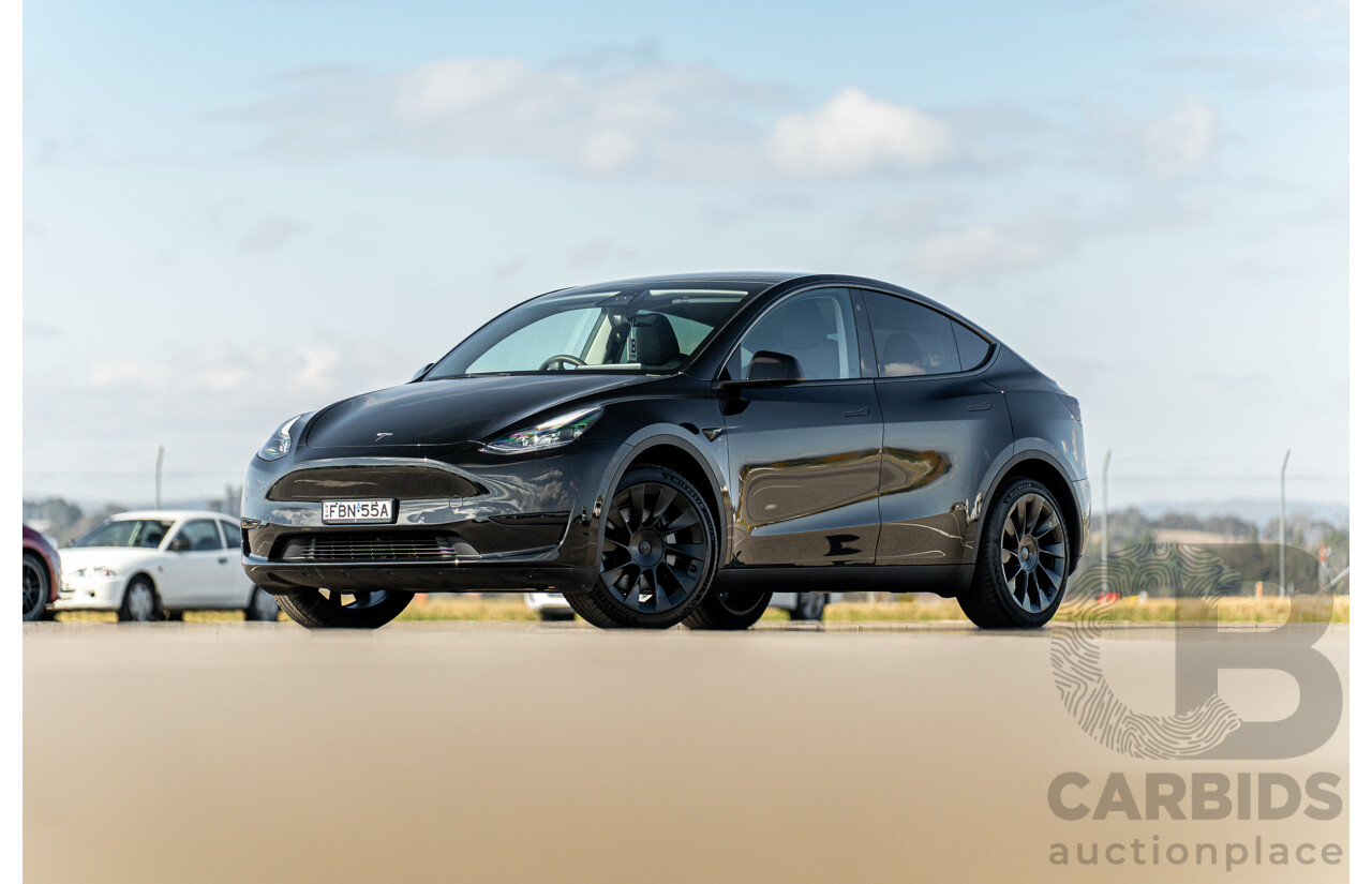 07/2023 Tesla Model Y Rear Wheel Drive 4d Wagon Solid Black Dedicated Electric EV 220kw