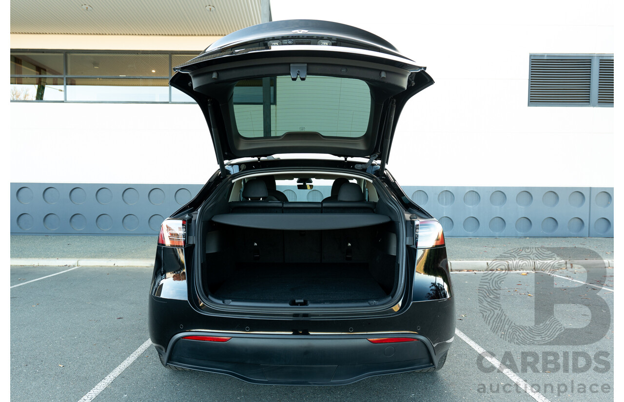 07/2023 Tesla Model Y Rear Wheel Drive 4d Wagon Solid Black Dedicated Electric EV 220kw
