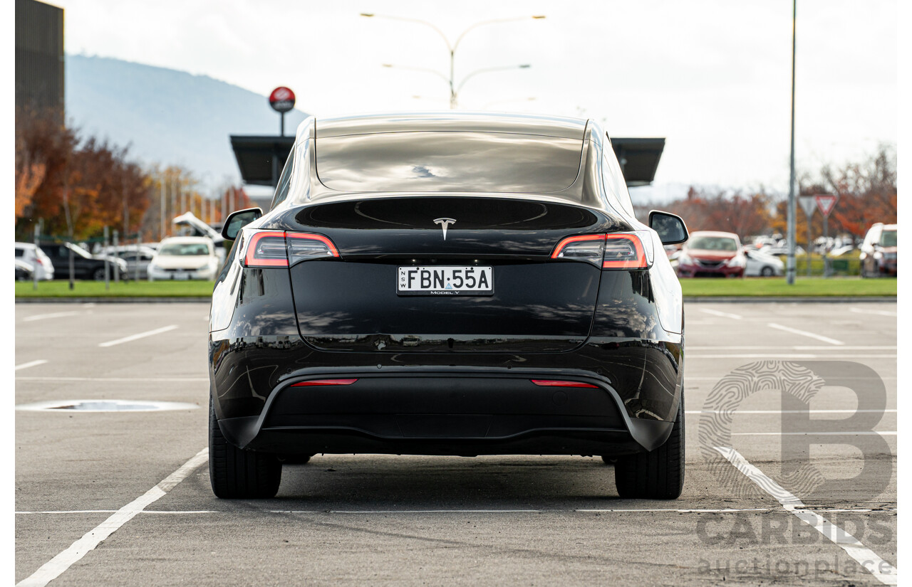 07/2023 Tesla Model Y Rear Wheel Drive 4d Wagon Solid Black Dedicated Electric EV 220kw