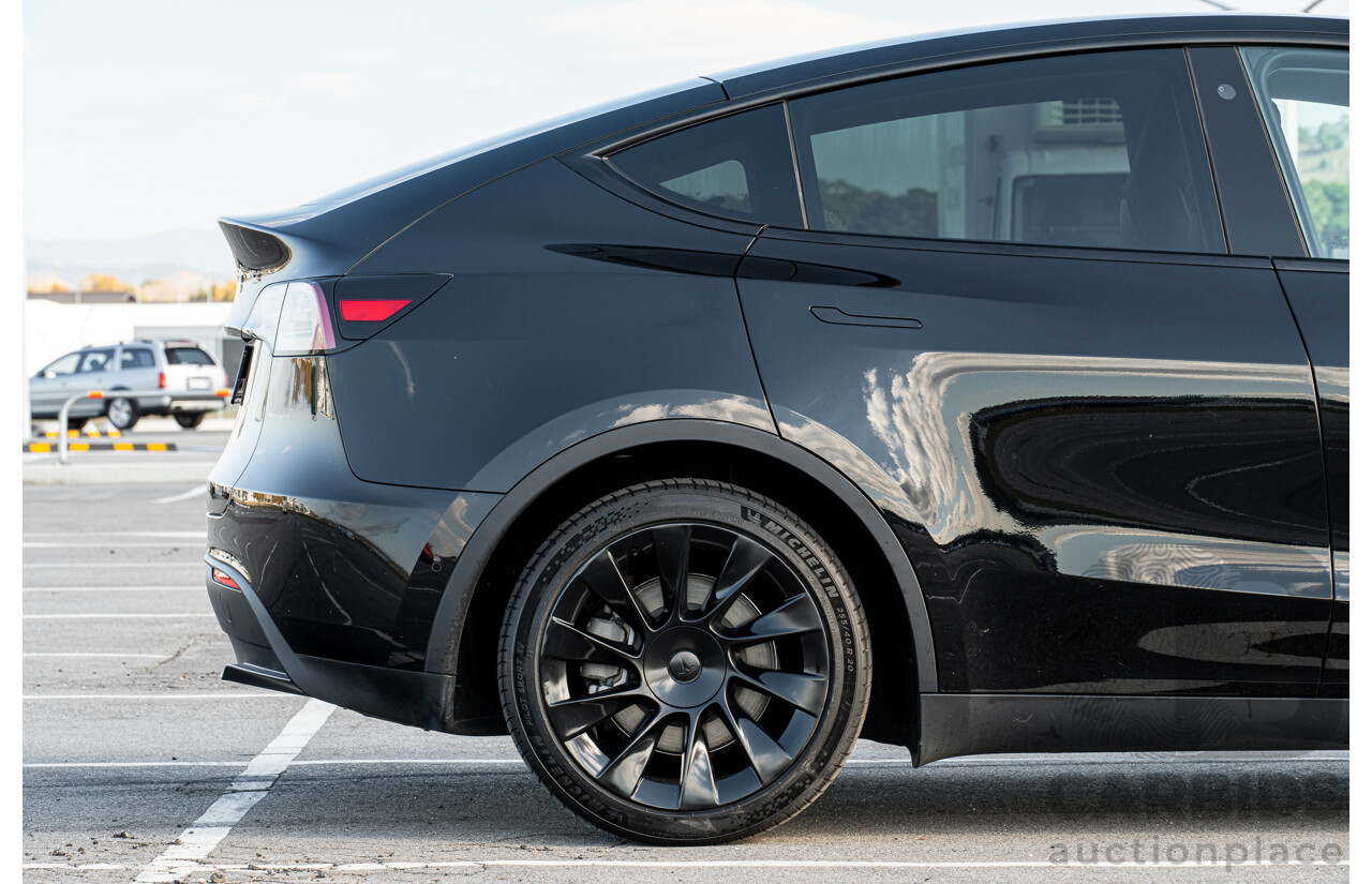 07/2023 Tesla Model Y Rear Wheel Drive 4d Wagon Solid Black Dedicated Electric EV 220kw