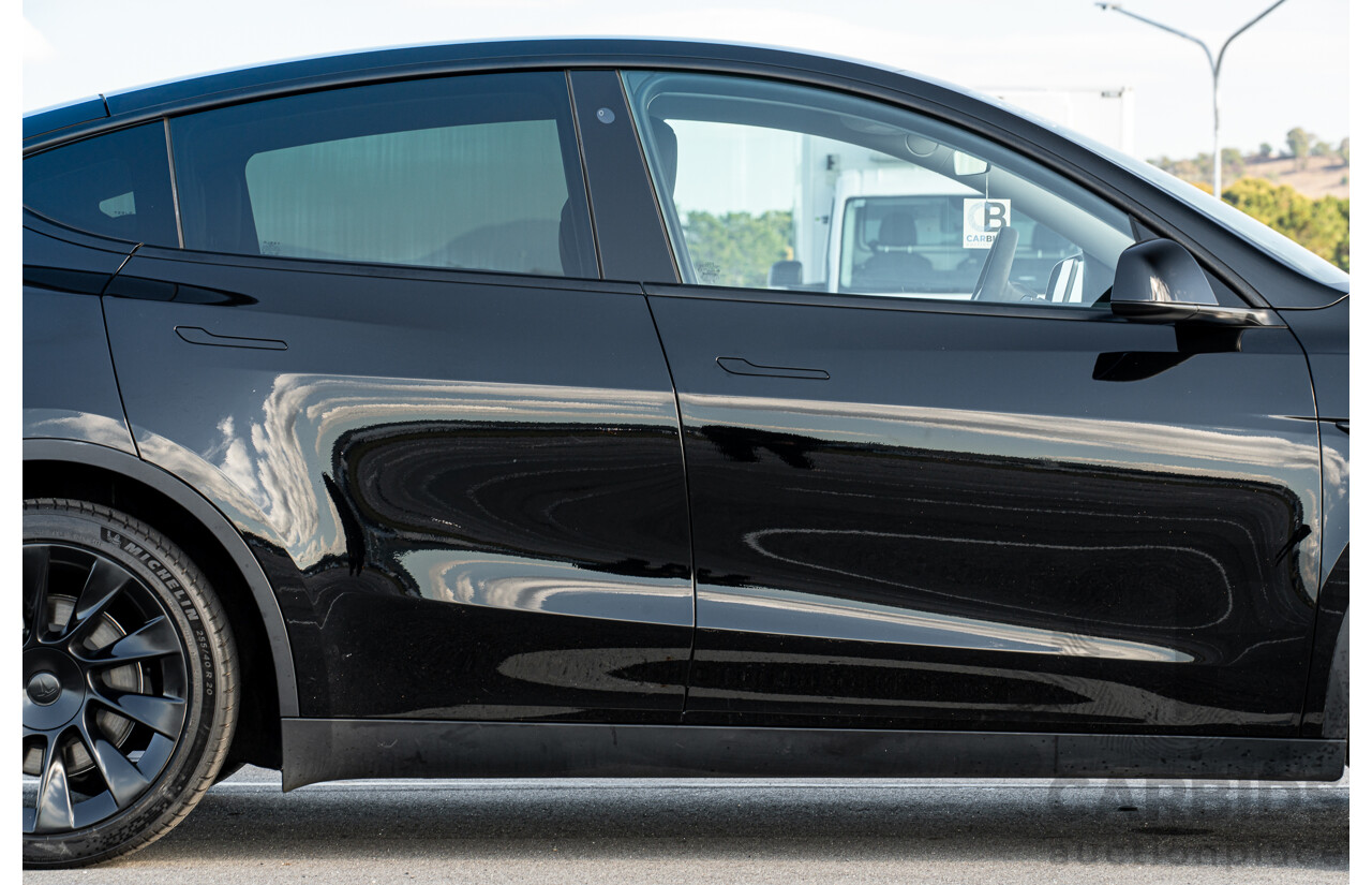 07/2023 Tesla Model Y Rear Wheel Drive 4d Wagon Solid Black Dedicated Electric EV 220kw