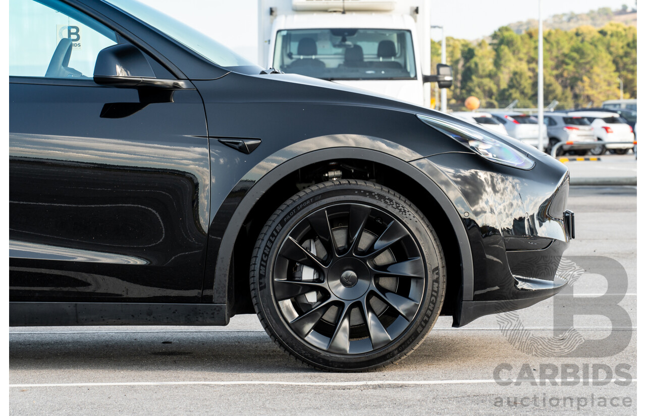 07/2023 Tesla Model Y Rear Wheel Drive 4d Wagon Solid Black Dedicated Electric EV 220kw