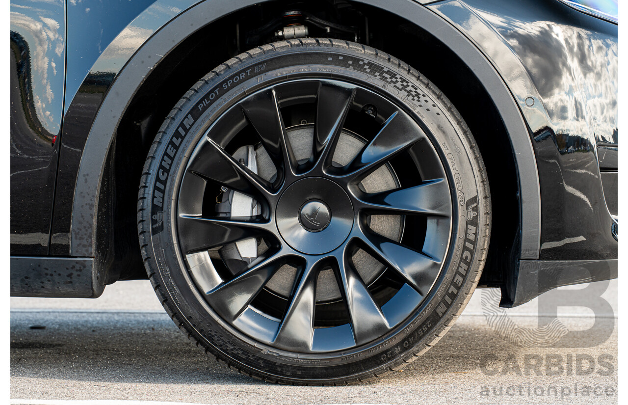 07/2023 Tesla Model Y Rear Wheel Drive 4d Wagon Solid Black Dedicated Electric EV 220kw