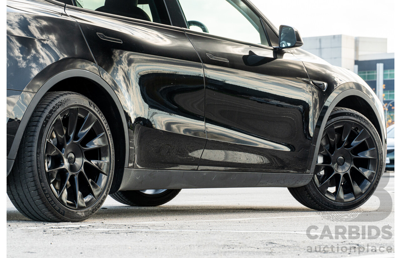 07/2023 Tesla Model Y Rear Wheel Drive 4d Wagon Solid Black Dedicated Electric EV 220kw