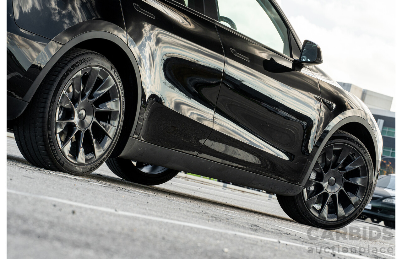 07/2023 Tesla Model Y Rear Wheel Drive 4d Wagon Solid Black Dedicated Electric EV 220kw