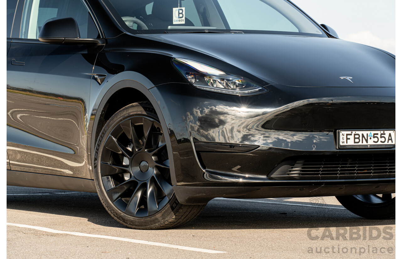 07/2023 Tesla Model Y Rear Wheel Drive 4d Wagon Solid Black Dedicated Electric EV 220kw