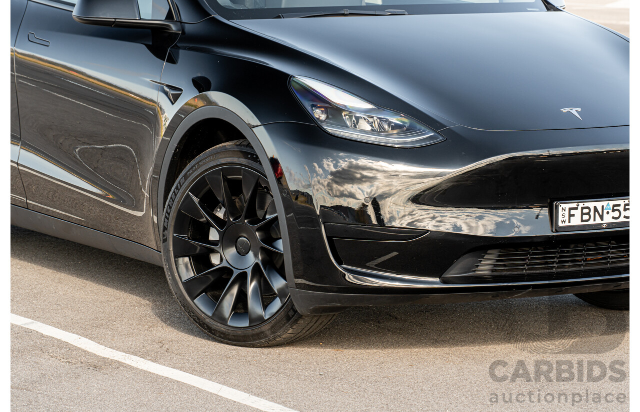 07/2023 Tesla Model Y Rear Wheel Drive 4d Wagon Solid Black Dedicated Electric EV 220kw