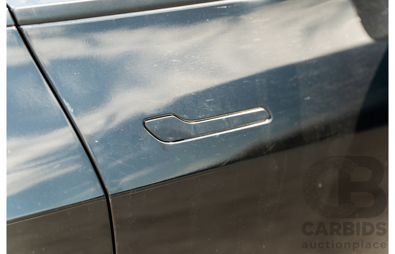 07/2023 Tesla Model Y Rear Wheel Drive 4d Wagon Solid Black Dedicated Electric EV 220kw