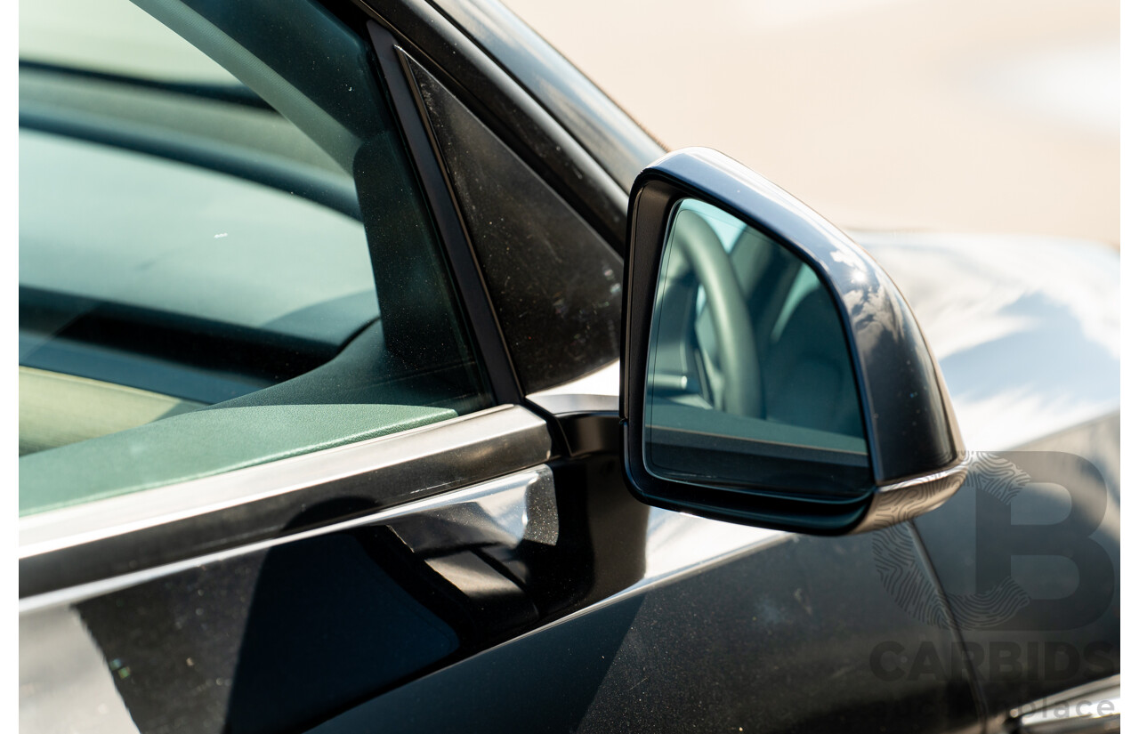 07/2023 Tesla Model Y Rear Wheel Drive 4d Wagon Solid Black Dedicated Electric EV 220kw