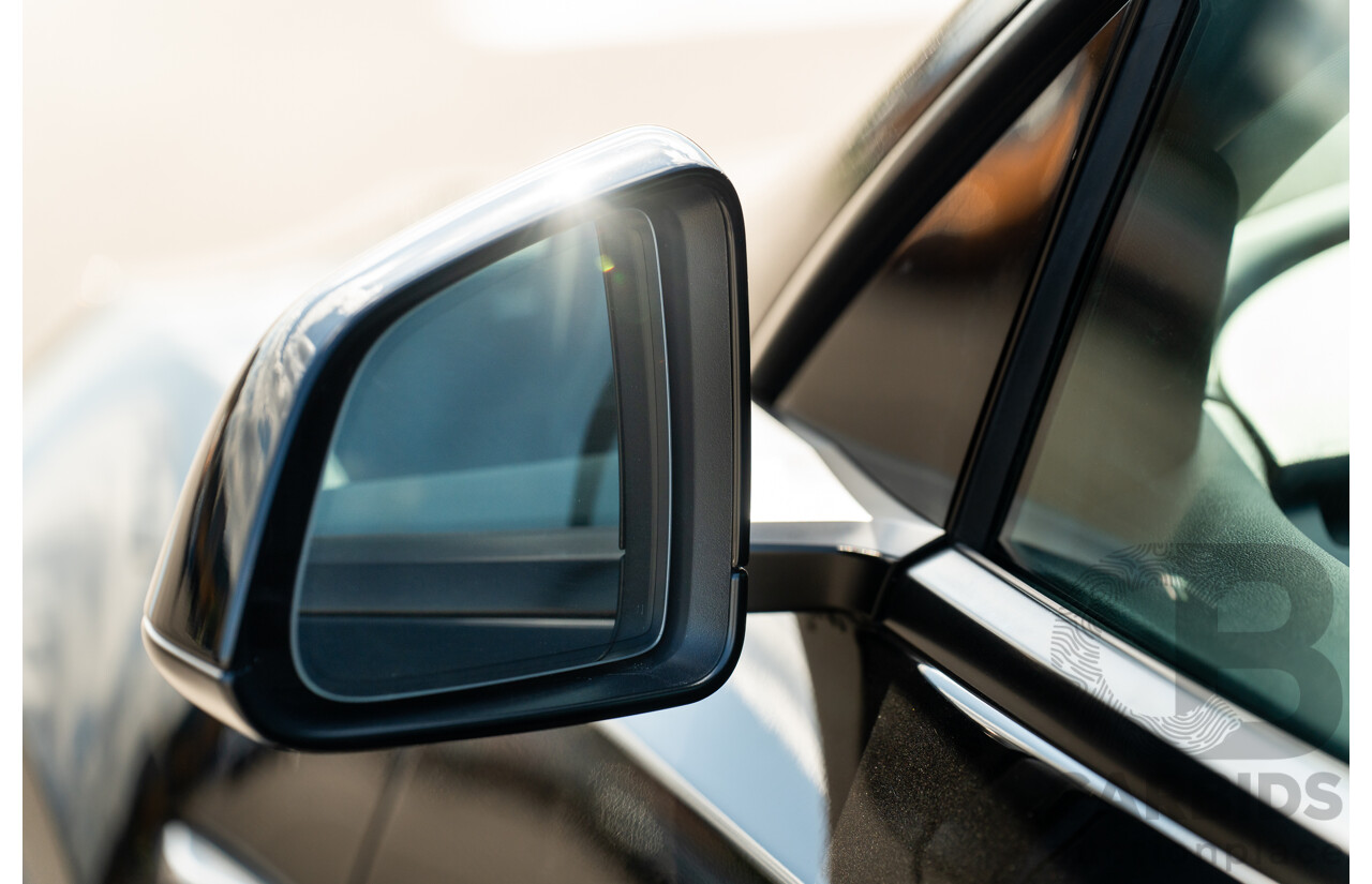 07/2023 Tesla Model Y Rear Wheel Drive 4d Wagon Solid Black Dedicated Electric EV 220kw