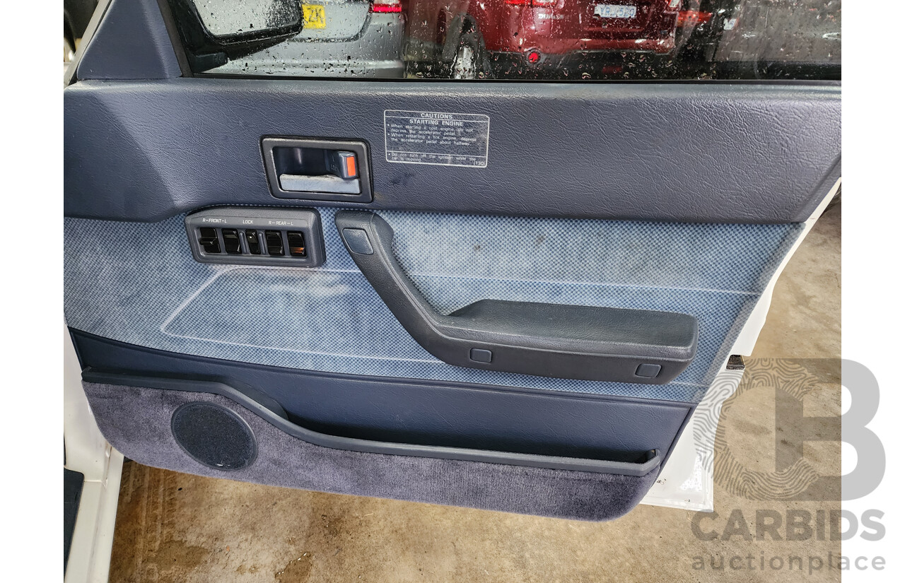 6/1989 Subaru GL Touring (4wd)  4d Wagon White 1.8L