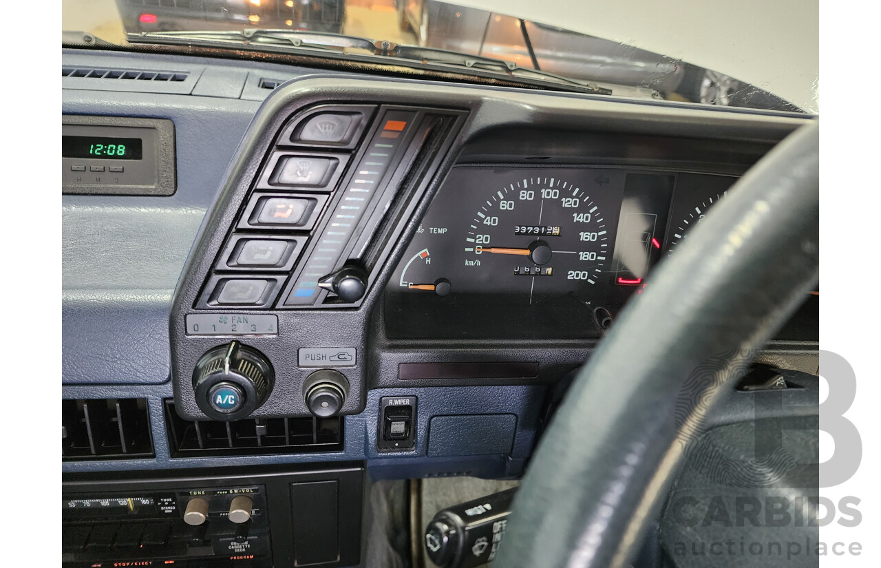 6/1989 Subaru GL Touring (4wd)  4d Wagon White 1.8L