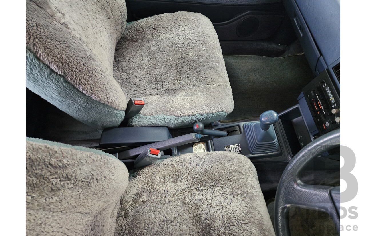 6/1989 Subaru GL Touring (4wd)  4d Wagon White 1.8L