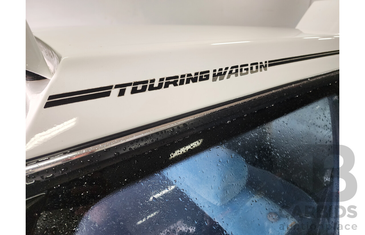 6/1989 Subaru GL Touring (4wd)  4d Wagon White 1.8L