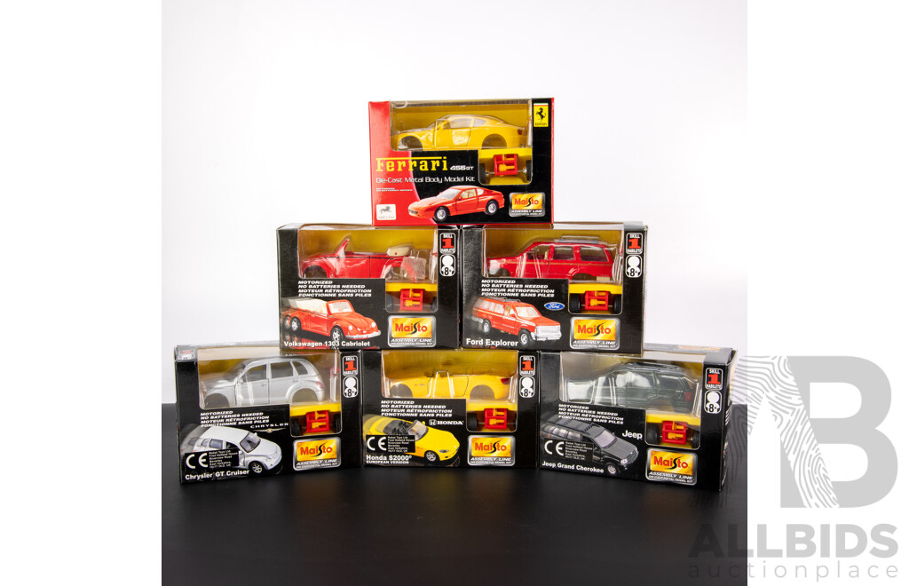 Six Maisto Assembly Line Diecast Model Kits Including Jeep, Ferrari, Ford, Volkswagen, Honda, Chrysler
