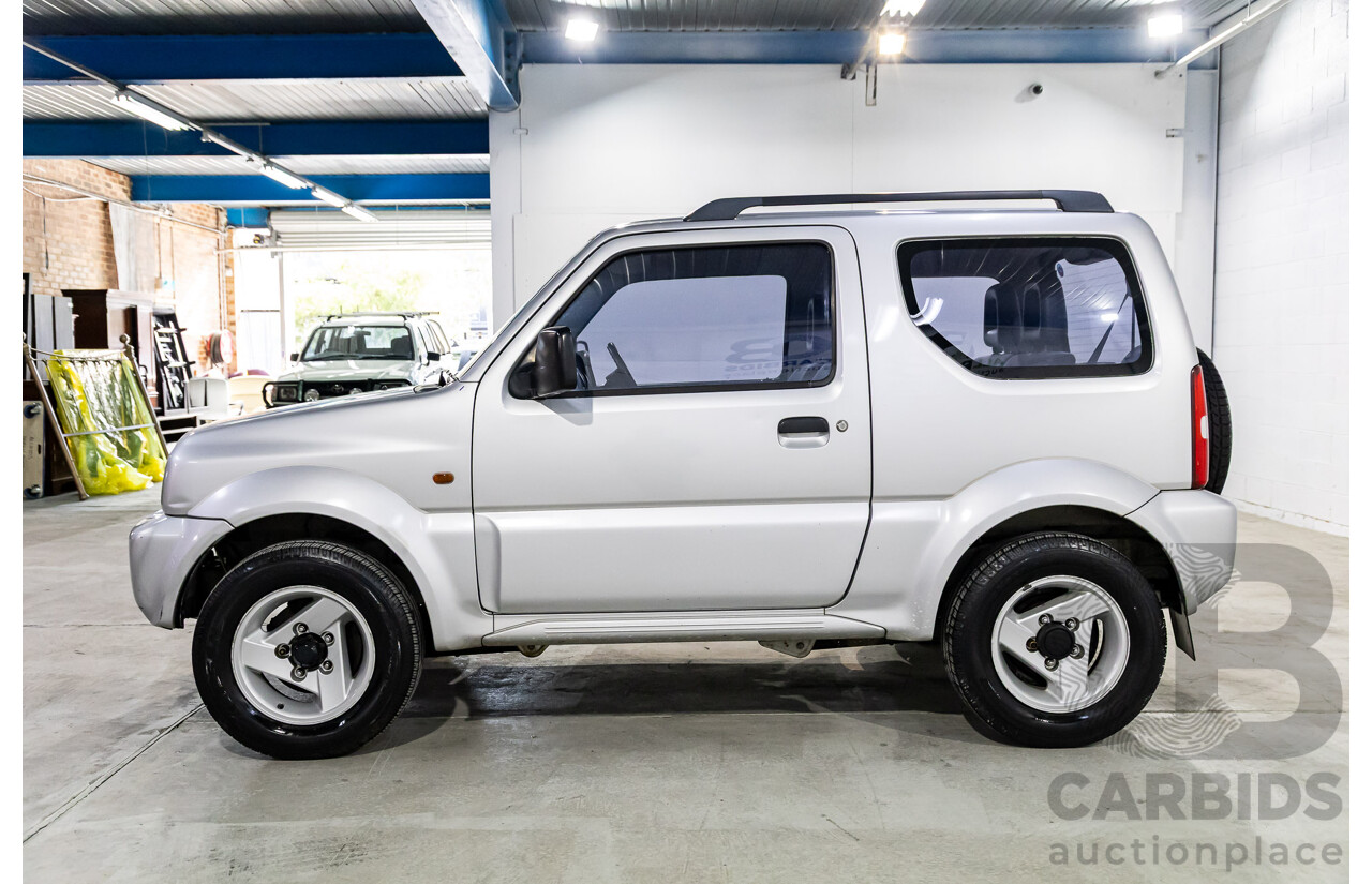 9/2001 Suzuki Jimny JLX (4x4) 2d Wagon Silky Silver Metallic 1.3L