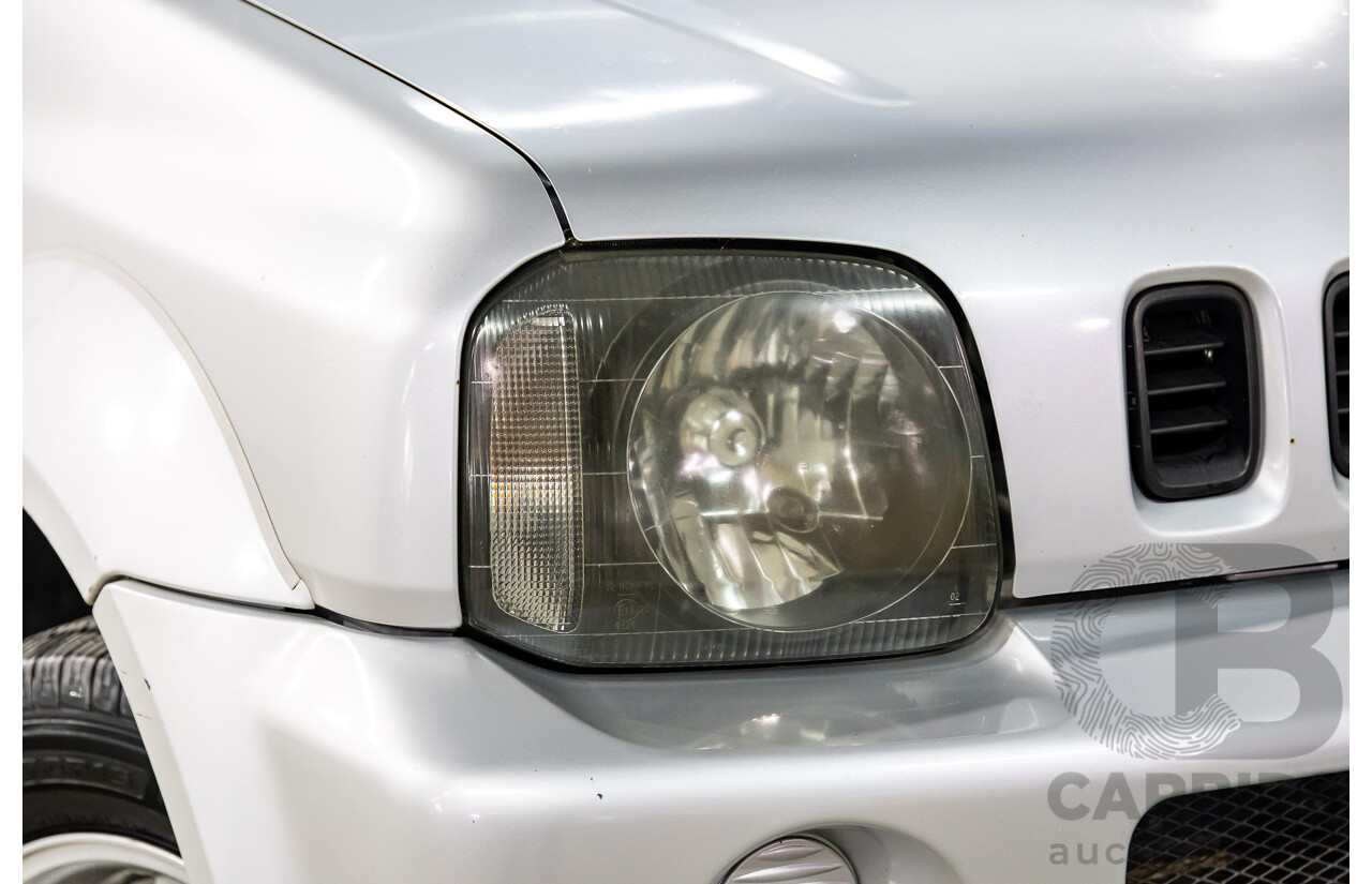 9/2001 Suzuki Jimny JLX (4x4) 2d Wagon Silky Silver Metallic 1.3L