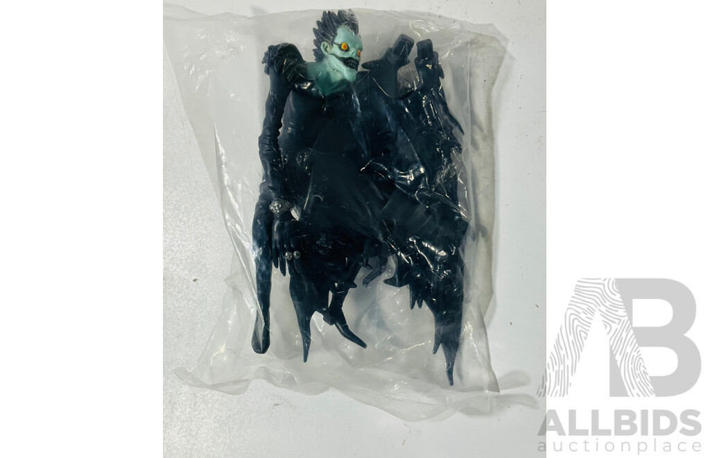 Collection of Three Figures From Different Anime Franchises Including Ryuk From Death Note, Portgas D. Ace From One Piece and Kakashi From Naruto